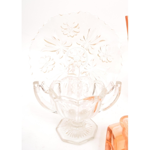 133 - A collection of 20th Century circa 1930s / 40s Art Deco peach pink glass items comprising of large c... 