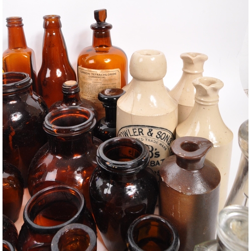 134 - A large collection of early 20th Century and later coloured glass bottles to include medicinal and p... 