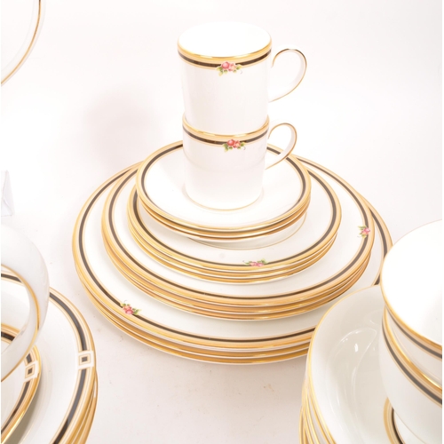 135 - Wedgwood - A porcelain bone china Wedgwood dinner and tea service in the Clio pattern. Comprising of... 