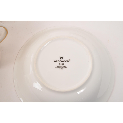 135 - Wedgwood - A porcelain bone china Wedgwood dinner and tea service in the Clio pattern. Comprising of... 