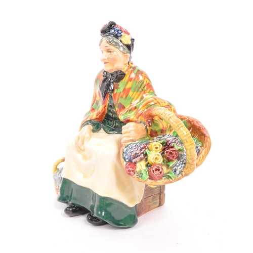 137 - Royal Doulton - A 20th Century vintage porcelain china Royal Doulton figurine ' The Old Lavender Sel... 