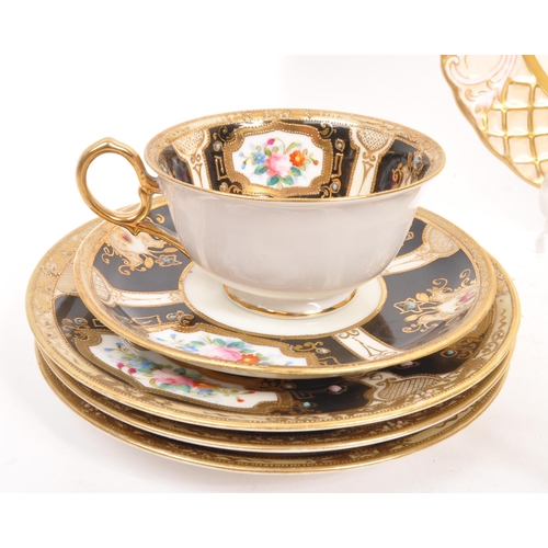 139 - Noritake - A set of porcelain china Noritake jewelled gilt items comprising of two teacups and sauce... 