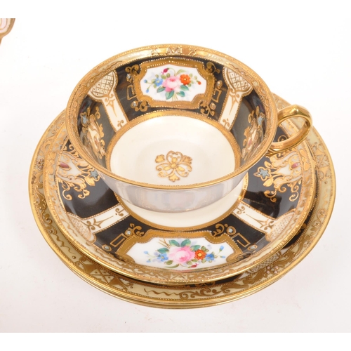 139 - Noritake - A set of porcelain china Noritake jewelled gilt items comprising of two teacups and sauce... 