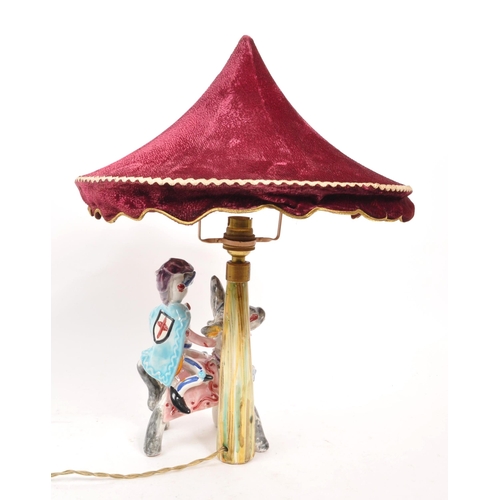 142 - A 20th Century vintage Italian ceramic hand painted novelty crusader / carousel lamp. Signed to base... 