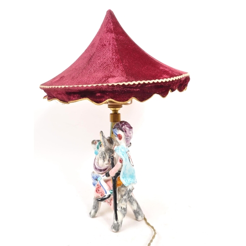 142 - A 20th Century vintage Italian ceramic hand painted novelty crusader / carousel lamp. Signed to base... 