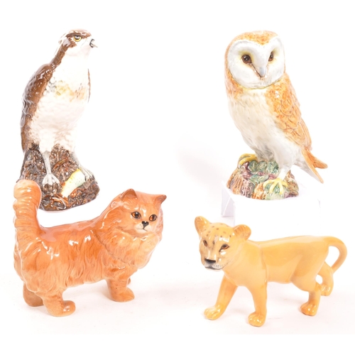 151 - Beswick - A collection of eight 20th Century vintage porcelain china animal figures by Beswick. To i... 