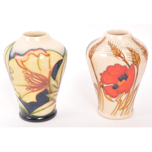 157 - Moorcroft Pottery - Two contemporary ceramic vases - Comprising of harvest poppy shape 576/4 togethe... 