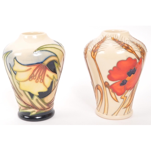 157 - Moorcroft Pottery - Two contemporary ceramic vases - Comprising of harvest poppy shape 576/4 togethe... 