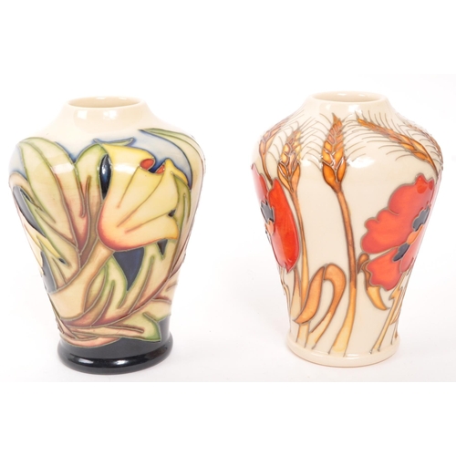 157 - Moorcroft Pottery - Two contemporary ceramic vases - Comprising of harvest poppy shape 576/4 togethe... 