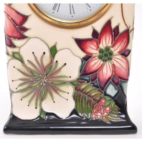 166 - Moorcroft Pottery - A contemporary ceramic mantel clock. Bramble Revisited design with white face, e... 