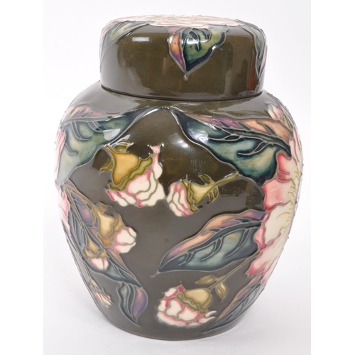 168 - Moorcroft Pottery - A late 20th century Moorcroft Gustavia Augusta pattern ginger jar and cover desi... 