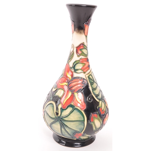 177 - Moorcroft Pottery - Palmata - Designed by Shirley Hayes tube lined floral design bud / stem vase in ... 