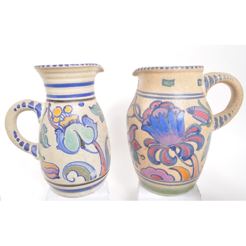 187 - A collection of vintage 20th century Honiton, Devon stoneware pottery jugs and vases. Hand painted, ... 