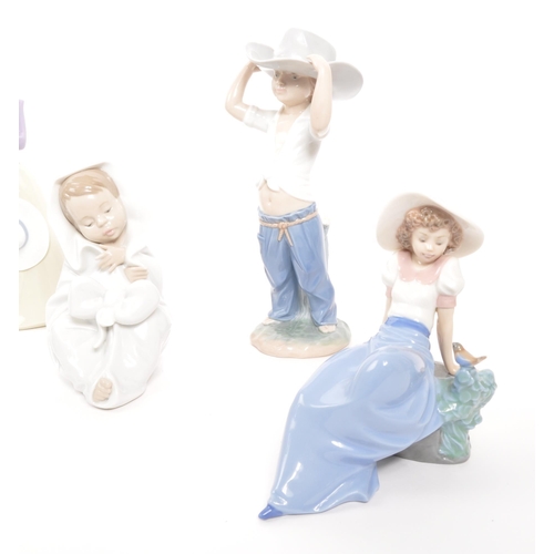 191 - Nao for lladro - A collection of six 20th century Spanish porcelain figurines to include boys and gi... 