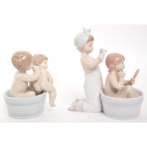 193 - Lladro - Two 20th century Spanish porcelain figurines to include Bathing Beauties 6457 and Bath Time... 