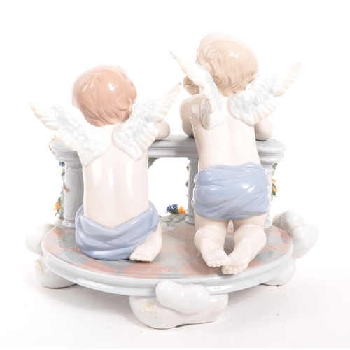 2 - Lladro - A contemporary 2012 celestial / cherub balcony figure. Spanish gloss porcelain construction... 