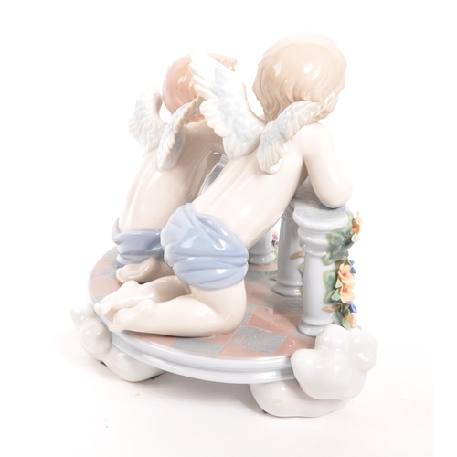 2 - Lladro - A contemporary 2012 celestial / cherub balcony figure. Spanish gloss porcelain construction... 