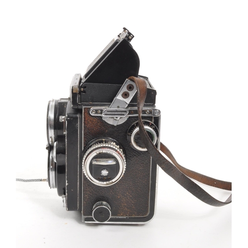 200 - Rolleiflex - A mid 20th century circa. 1950s Rollei Rolleiflex 2.8E medium format TLR twin lens refl... 