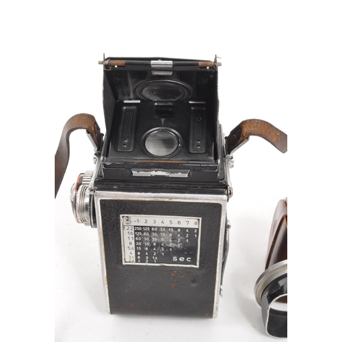 200 - Rolleiflex - A mid 20th century circa. 1950s Rollei Rolleiflex 2.8E medium format TLR twin lens refl... 