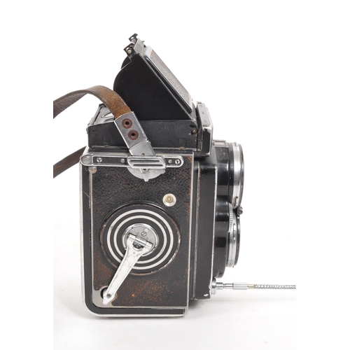 200 - Rolleiflex - A mid 20th century circa. 1950s Rollei Rolleiflex 2.8E medium format TLR twin lens refl... 