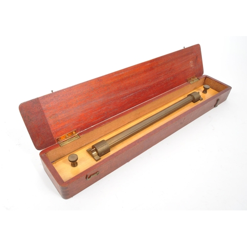 202 - J A Nicholl - A mid 20th century J A Nicholl parellel rolling ruler. The rule having a wooden body, ... 