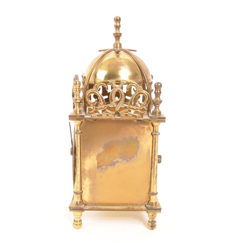 223 - Smiths - A vintage mid 20th century brass lantern mantel clock. With later battery operated movement... 