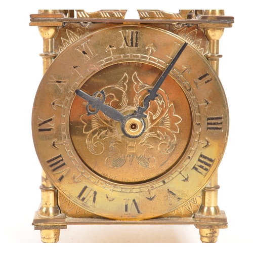 223 - Smiths - A vintage mid 20th century brass lantern mantel clock. With later battery operated movement... 