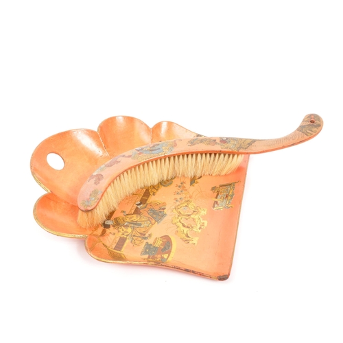 224 - A vintage 20th century lacquered chinoiserie crumb tray / dustpan and brush. The tray having a scall... 