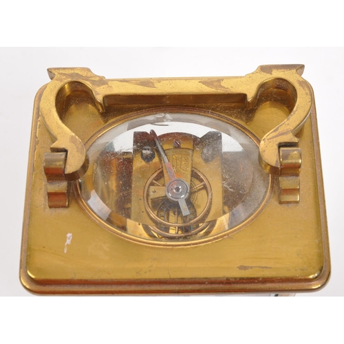 227 - Mappin Brothers - Early 20th century French brass carriage / mantel clock. Carry handle to top, whit... 