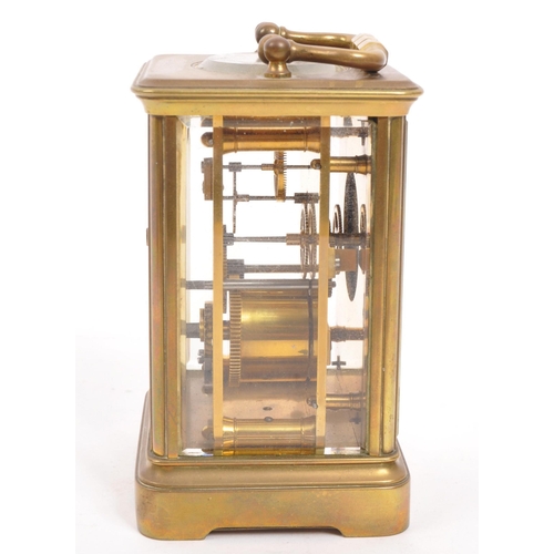 229 - Wordley & Co - An early 20th century Paris, France brass carriage clock. With carry handle to to... 