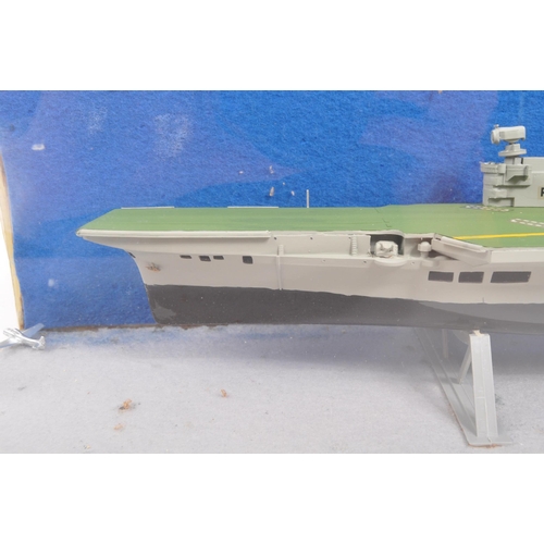 233 - H. M. S. Victorious - A vintage 20th century handmade model aircraft carrier vessel boat. In a glass... 