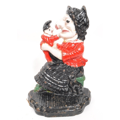 235 - Punch & Judy - A set of 20th century cast iron Punch and Judy doorstops. The figurative doorstop... 