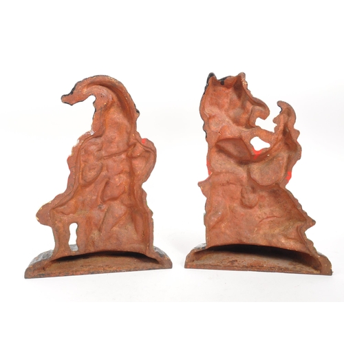 235 - Punch & Judy - A set of 20th century cast iron Punch and Judy doorstops. The figurative doorstop... 