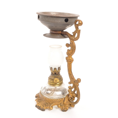 250 - A late 19th century Victorian oil lamp / censer. The lamp featuring a pressed glass reservoir with '... 