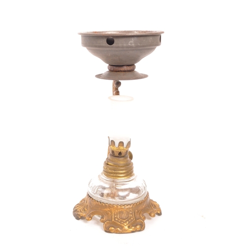 250 - A late 19th century Victorian oil lamp / censer. The lamp featuring a pressed glass reservoir with '... 