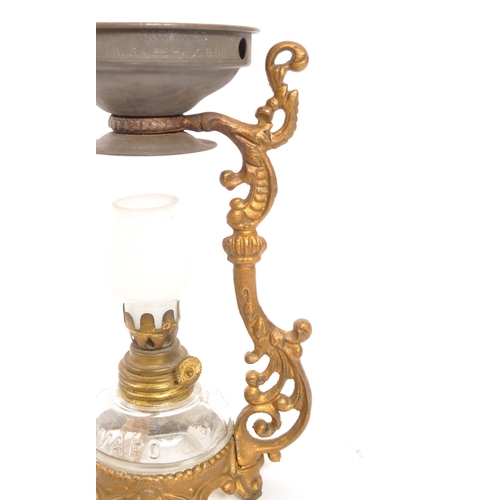 250 - A late 19th century Victorian oil lamp / censer. The lamp featuring a pressed glass reservoir with '... 