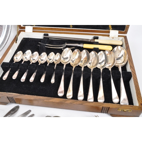 253 - A collection of vintage 20th century silver plated items. To include teaspoons, a canteen of cutlery... 