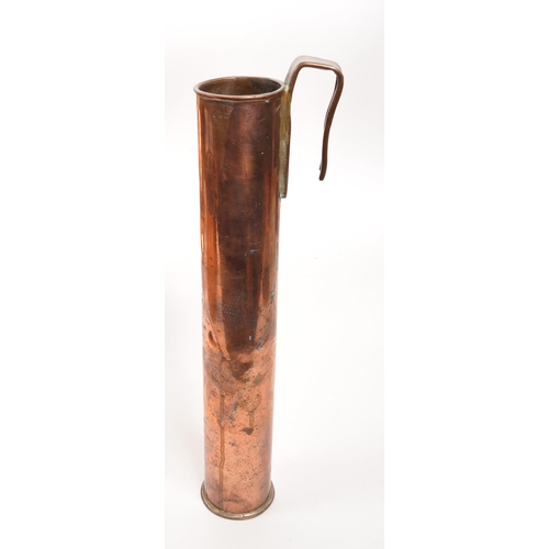 256 - A collection of 19th and 20th century brass and copper measures. The collection to include two coppe... 