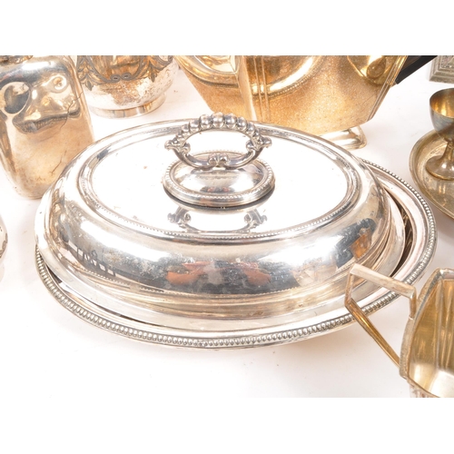 257 - A mixed collection of vintage 20th century silver plate items. Including teapot, entree dishes, gall... 