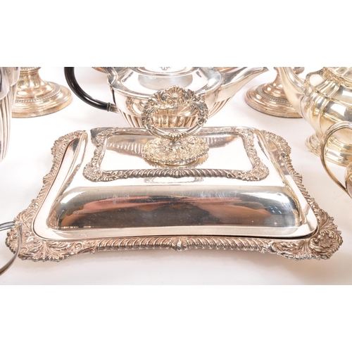 259 - A collection of vintage 20th century silver plated items. Including teapots, entree dishes, flasks, ... 