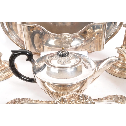 259 - A collection of vintage 20th century silver plated items. Including teapots, entree dishes, flasks, ... 