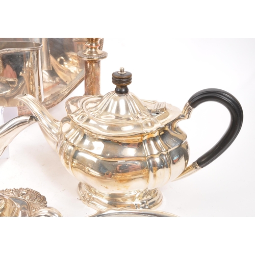 259 - A collection of vintage 20th century silver plated items. Including teapots, entree dishes, flasks, ... 