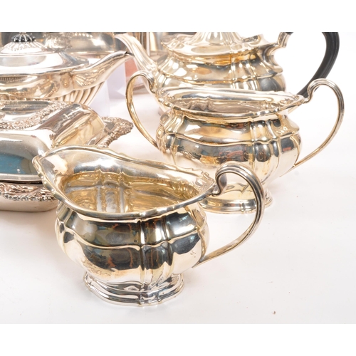 259 - A collection of vintage 20th century silver plated items. Including teapots, entree dishes, flasks, ... 