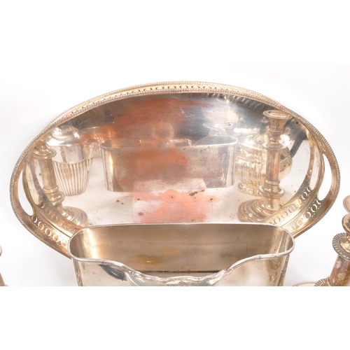 259 - A collection of vintage 20th century silver plated items. Including teapots, entree dishes, flasks, ... 