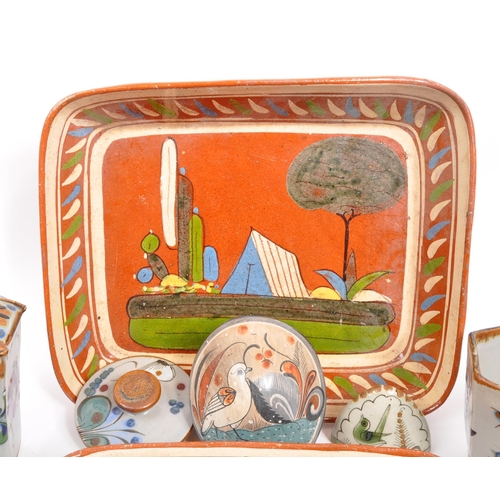 26 - A large collection of 20th century Mexican ceramic pottery items. The collection to include decorati... 