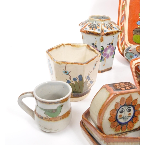 26 - A large collection of 20th century Mexican ceramic pottery items. The collection to include decorati... 