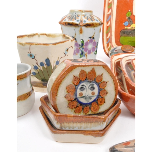 26 - A large collection of 20th century Mexican ceramic pottery items. The collection to include decorati... 