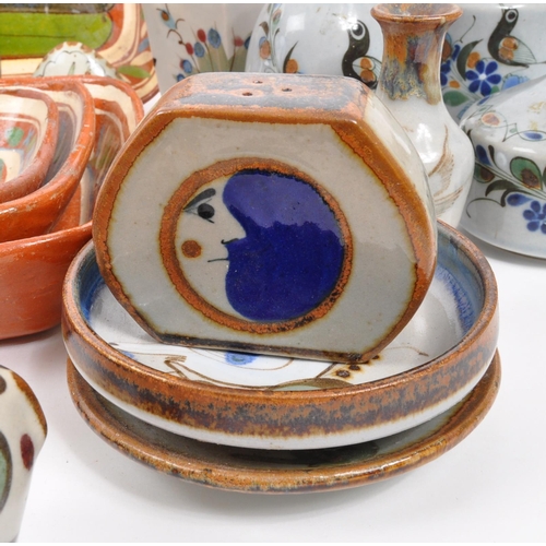 26 - A large collection of 20th century Mexican ceramic pottery items. The collection to include decorati... 