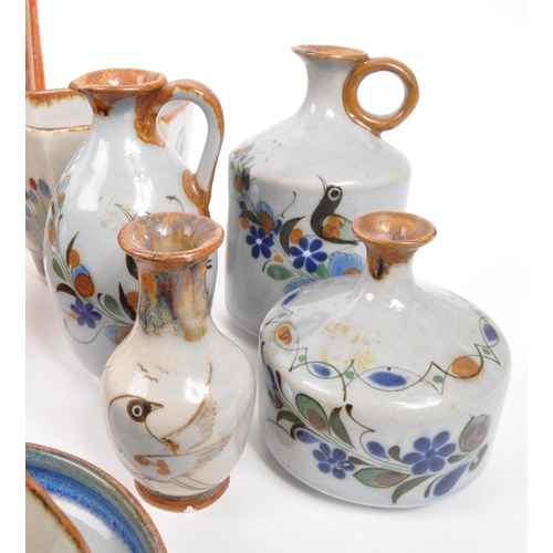 26 - A large collection of 20th century Mexican ceramic pottery items. The collection to include decorati... 