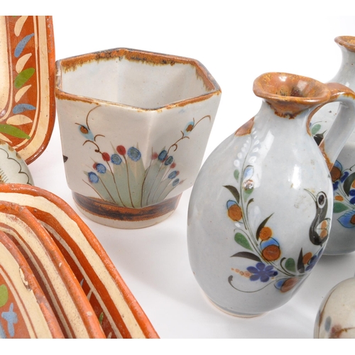 26 - A large collection of 20th century Mexican ceramic pottery items. The collection to include decorati... 